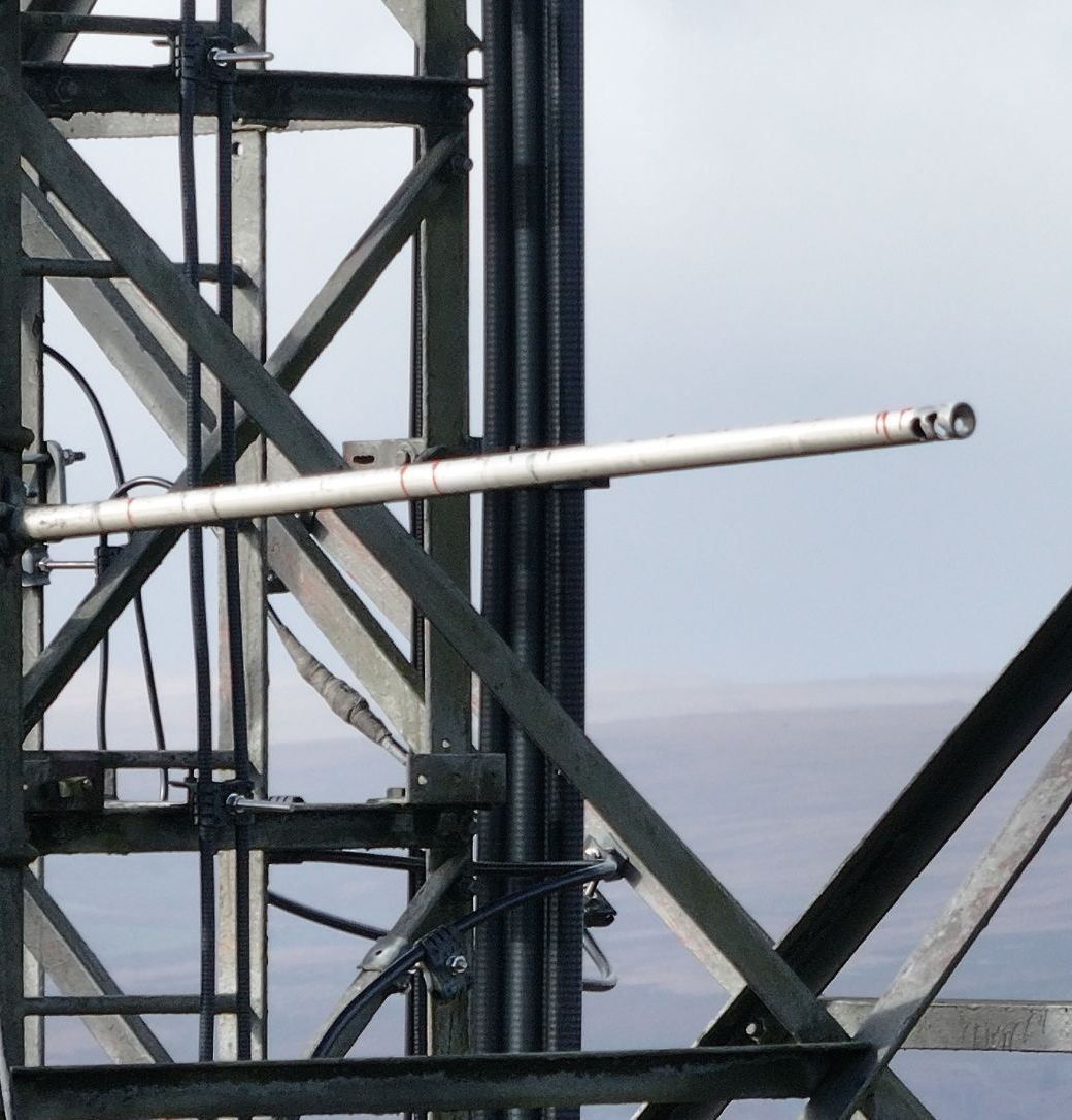 Close-up of fractured telecom mast boom damage
