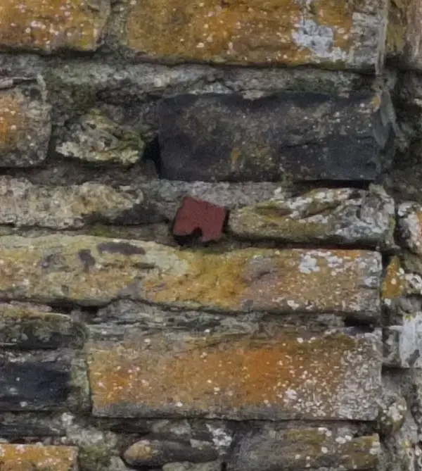 Heritage building perforated brick detail.