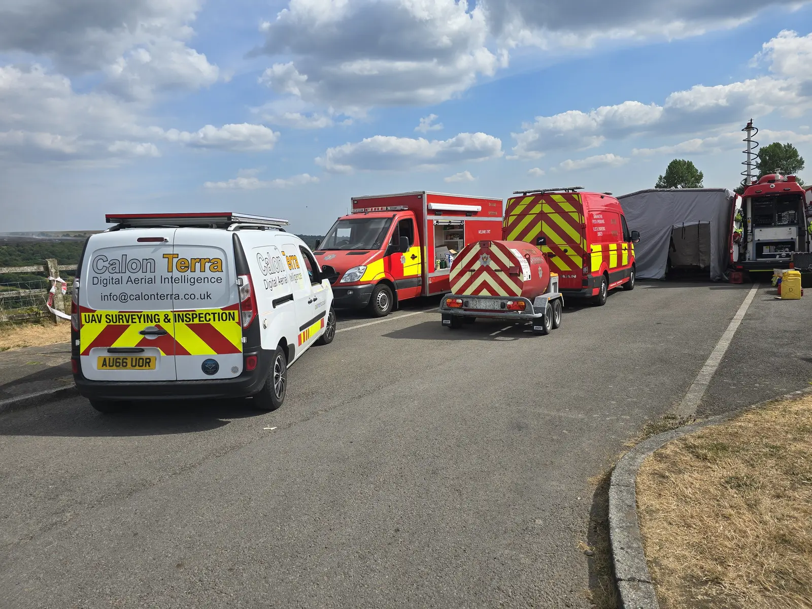 CalonTerra survey vehicle alongside South Wales Fire and Rescue Service appliances at the Blaenavon wildfire incident command point, Torfaen